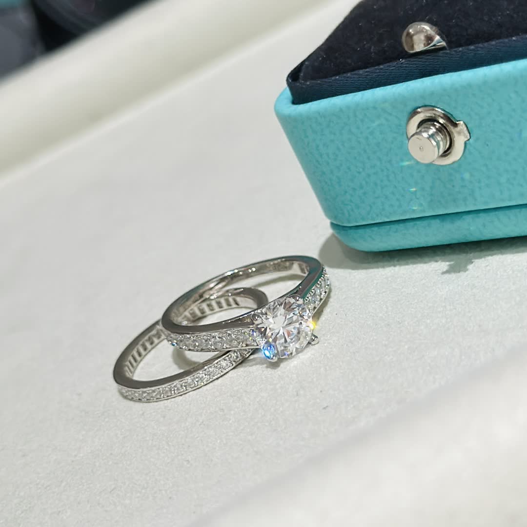 Tiffany & Co. Solitaire Ring with Diamond Band